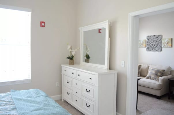 Cozy interior of a resident room with furniture