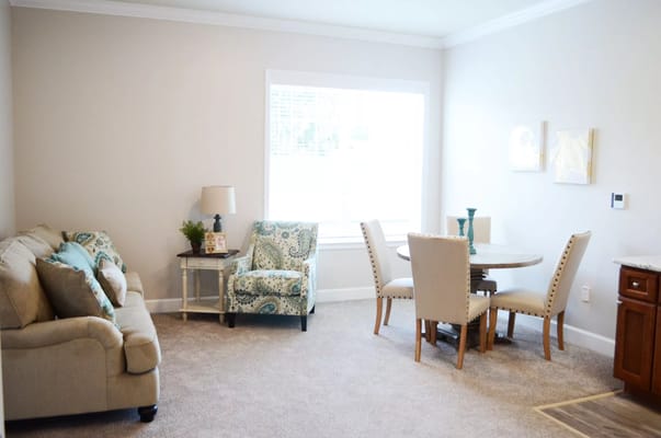 Cozy interior living space with seating and dining area