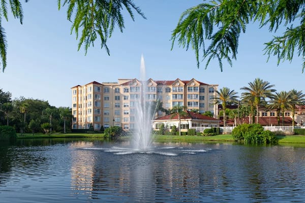 Exterior view of The Mayflower at Winter Park near a fountain