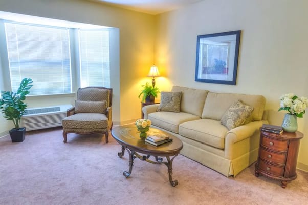 Inviting living room with a sofa, chair, and decorative accents