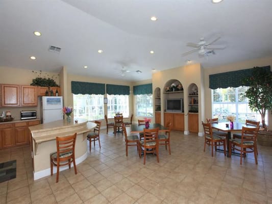 Bright common area with tables and chairs