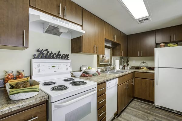 Stylish kitchen with appliances and cabinetry