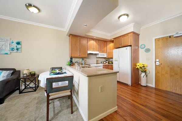 Cozy kitchen area in a senior living apartment