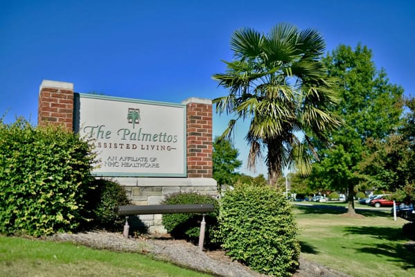 Entrance sign of The Palmettos assisted living facility