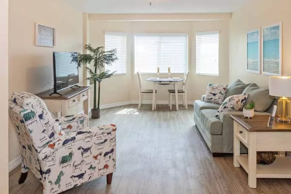 Bright living room with comfortable seating and dining area