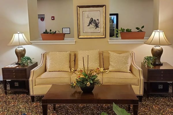 Cozy lounge area with sofa and lamps