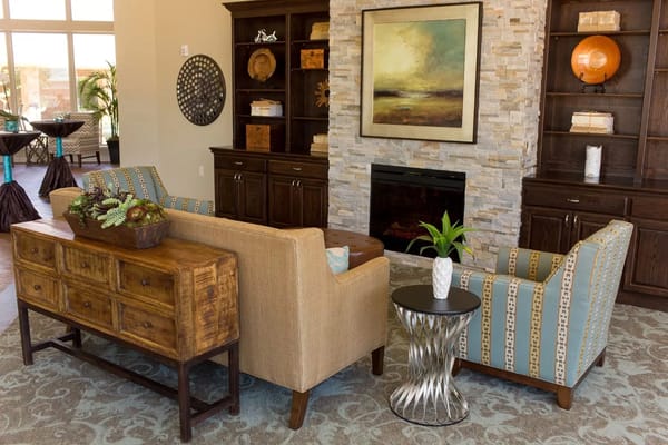 Stylish living room with modern furniture and a stone fireplace