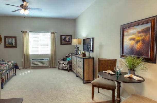 Cozy resident room with a table setting