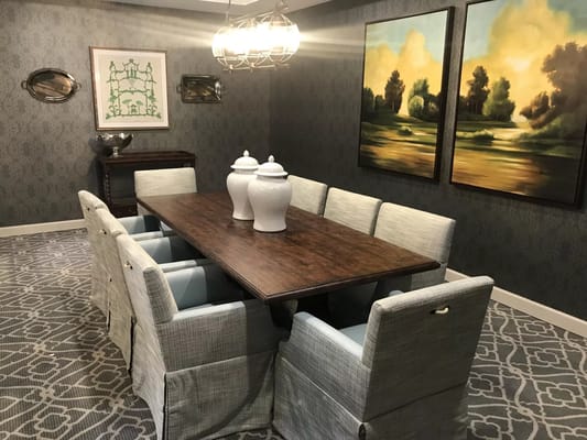 Elegant dining room with a large table and artistic decor