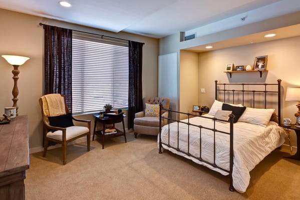 Cozy private room with bedding and seating area