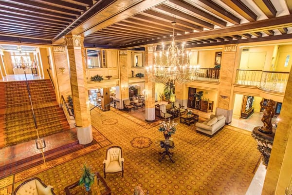 Spacious lobby area with elegant decor and seating