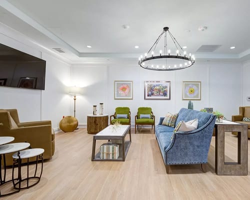 A cozy common area with seating and decor