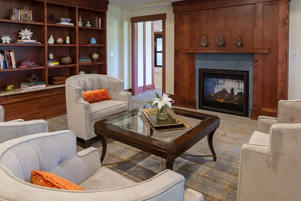 Comfortable living room with seating and a fireplace