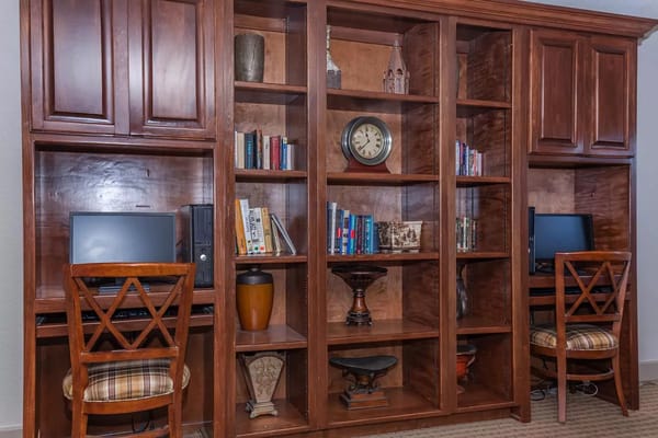 Interior space with bookshelves and computers