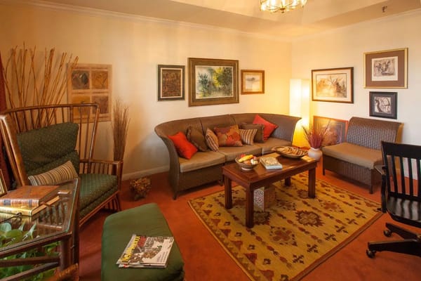 Comfortable living room with seating and artwork