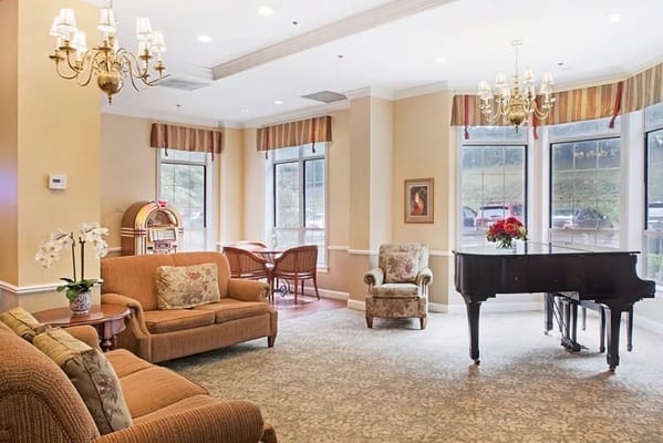 Cozy common area with seating and piano