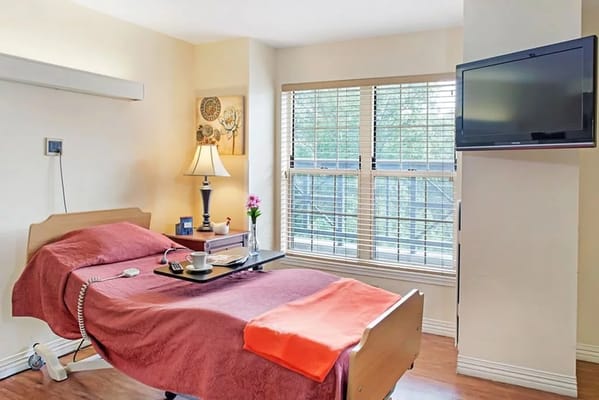 Comfortable private room with a bed and TV