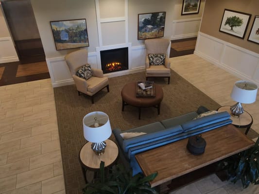 Interior common area with seating and fireplace