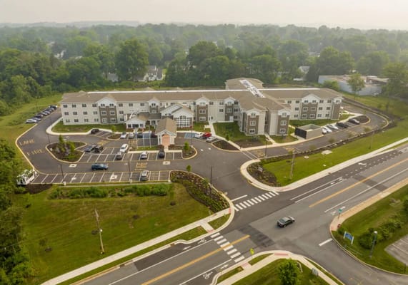 Aerial view of the exterior of The Vero at Newark senior living facility.