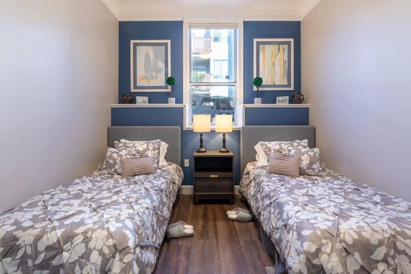 Bright interior of a shared resident bedroom
