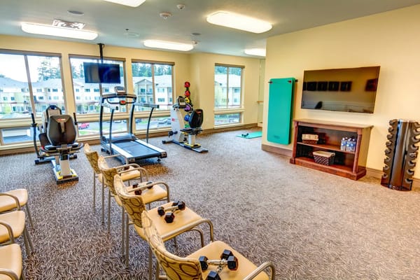 Fitness area with exercise equipment and seating