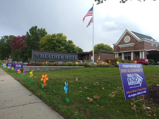 Exterior view of The Village of Heather Hills with signage