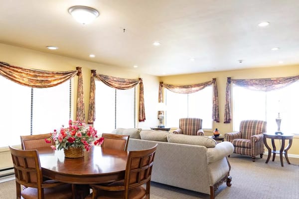 Cozy common area with seating and a dining table