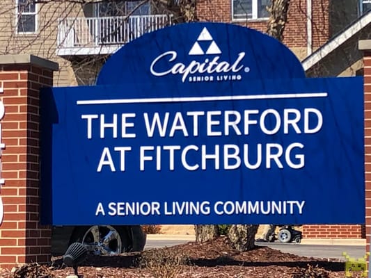 Sign for The Waterford at Fitchburg senior living community.