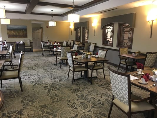 Dining room with tables set for meals