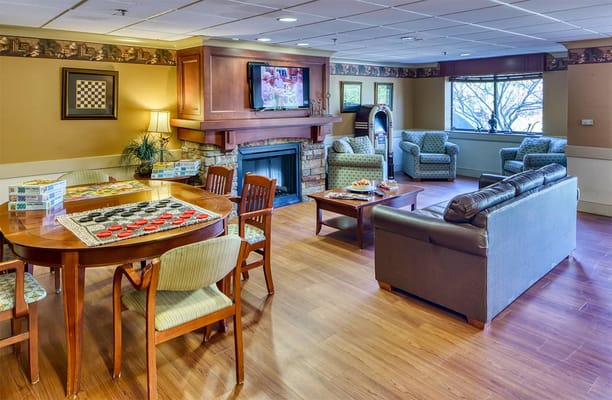 Common area with seating and a fireplace