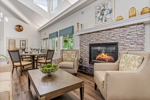 Common area featuring comfortable seating and a fireplace