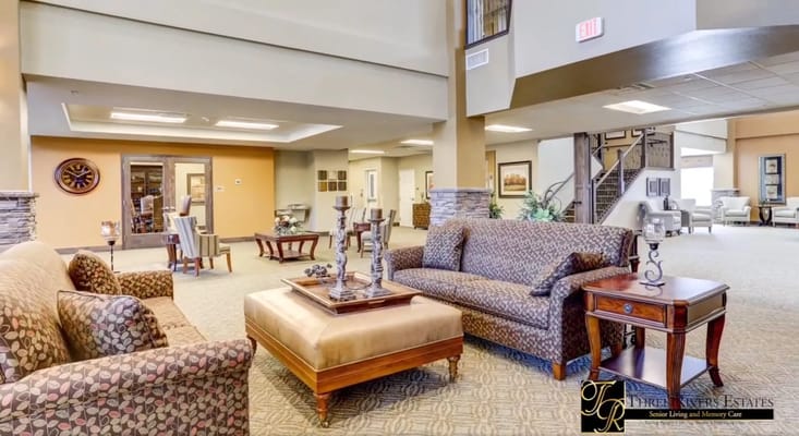 Lounge area with seating and decorative items in Three Rivers Estates