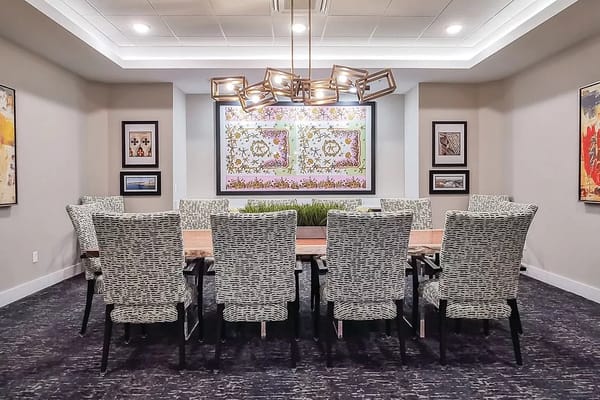 Bright and inviting dining room with modern decor and a large table