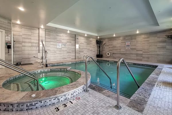 Indoor swimming pool with a hot tub