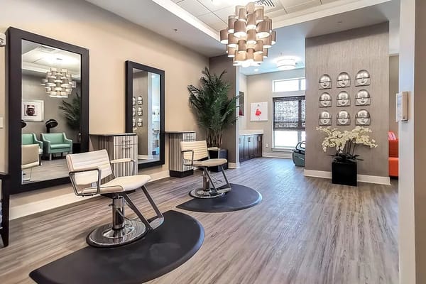 Stylish salon with two chairs and mirrors in a senior living facility