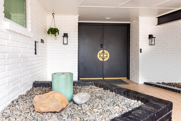 Entrance to a senior living facility with a welcoming decor