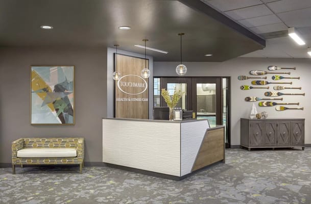Reception area of Touchmark Health & Fitness Club with modern decor