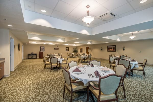 Dining room with tables set for a meal