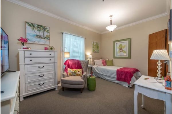 Bright, cozy resident room with comfortable furnishings