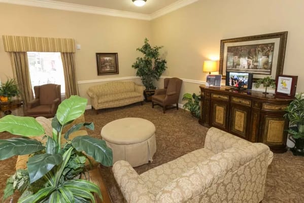 Comfortable seating area with couches and plants