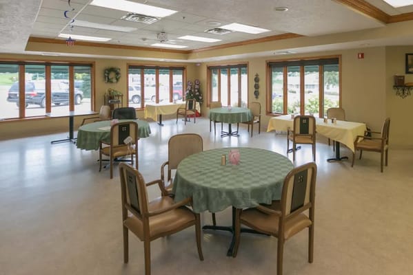 Dining room area with tables and chairs