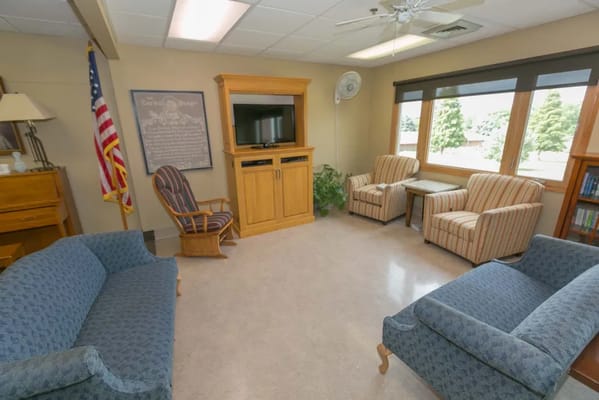 Cozy common area with seating and natural light