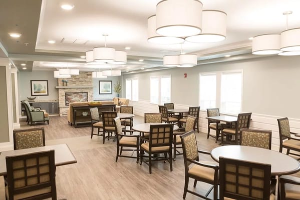 Bright dining room with tables and chairs