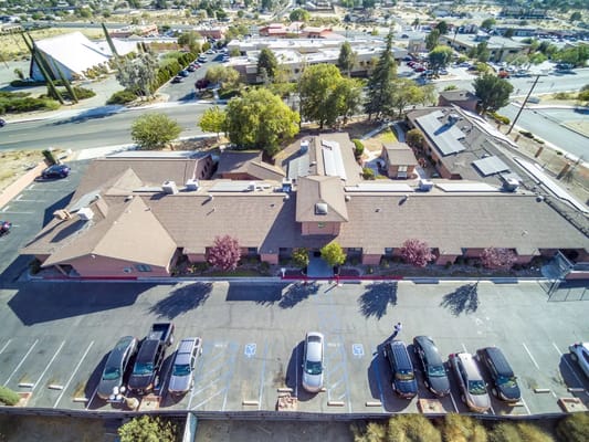 Aerial view of Valley Crest Memory Care with parking lot and surrounding area