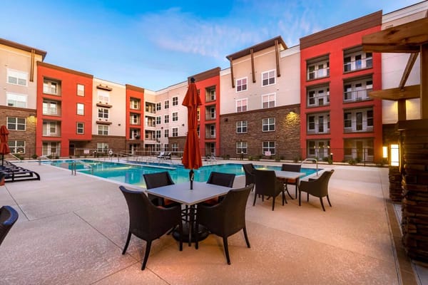 Pool area with seating at Verena at Gilbert senior living facility