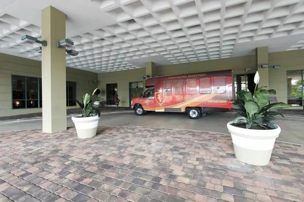 Facility transport vehicle parked outside