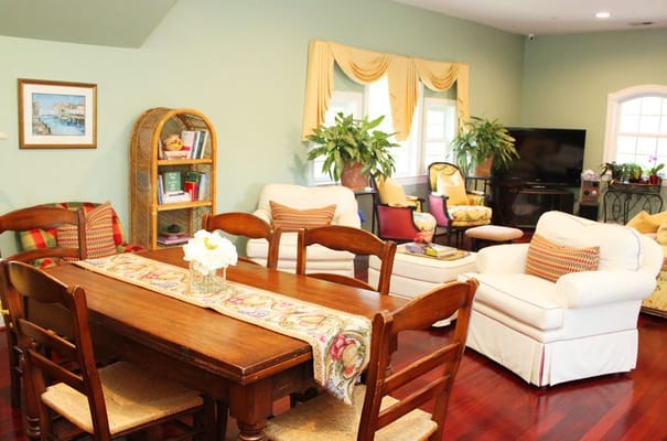 Cozy common area with comfortable seating and plants