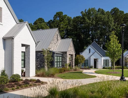 Pathway through landscaped grounds with residential buildings