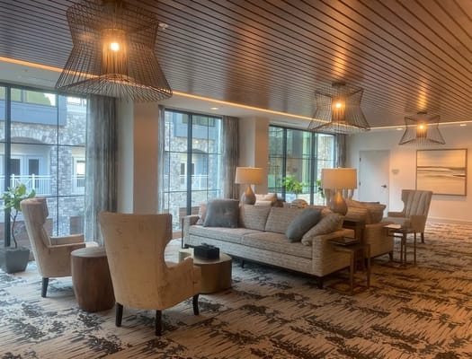 Spacious living room with comfortable seating and modern decor.