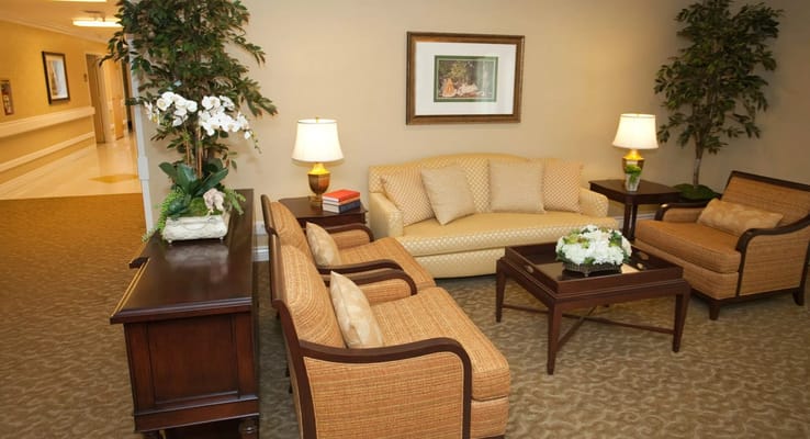 Welcoming living room with seating and decorative plants